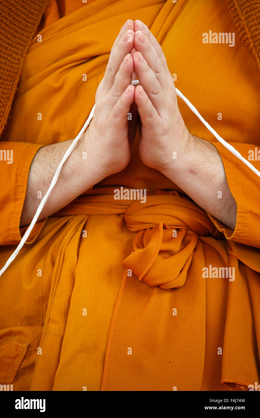 Monk praying, Wat Velouvanaram, Bussy Saint Georges, Seine et Marne, France, Europe Stock Photo