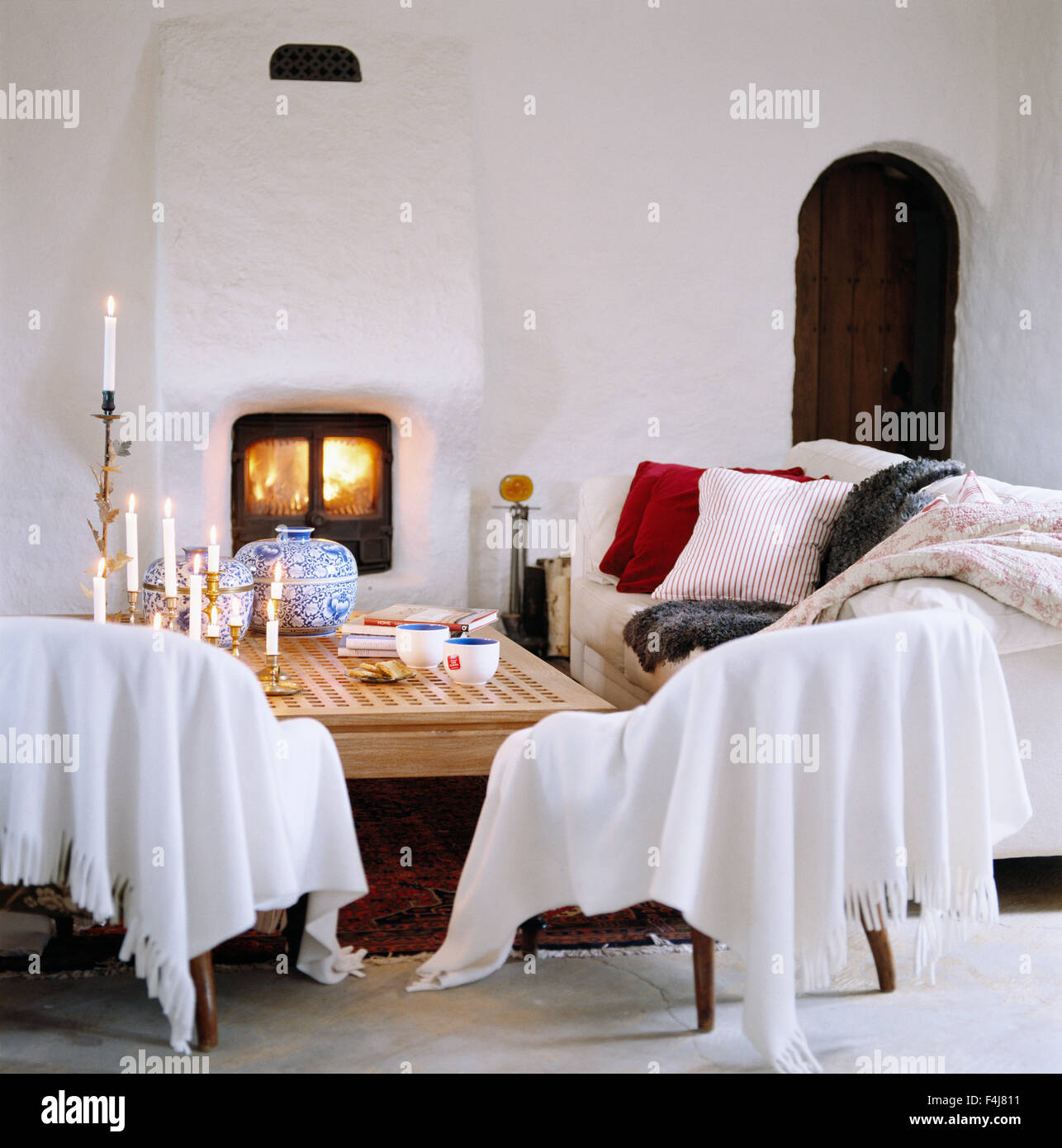 A livingroom with a fire place. Stock Photo