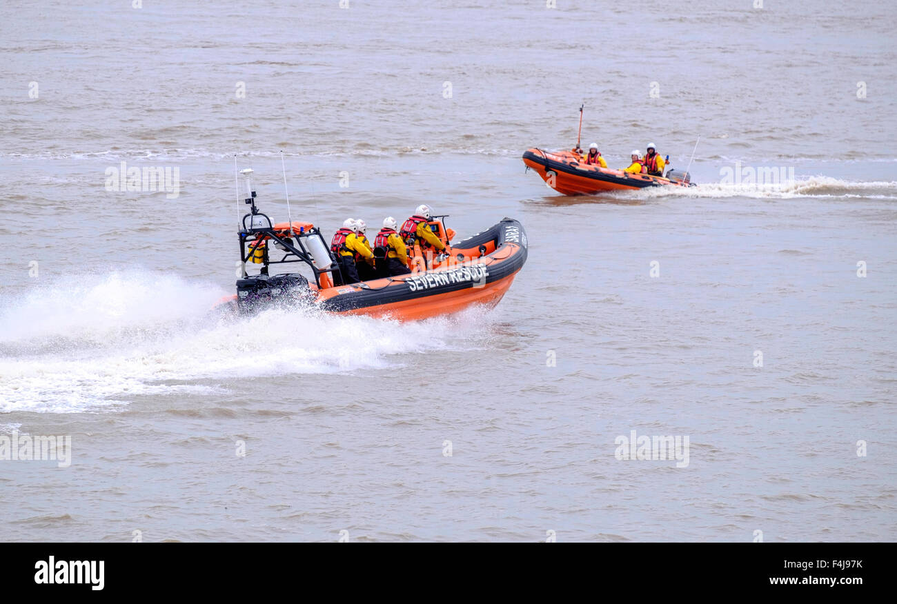 New SARA  (Severn Area Rescue Association)lifeboat 'Jim Hewitt' on River Severn after launch with previous lifeboat at Beachley Stock Photo