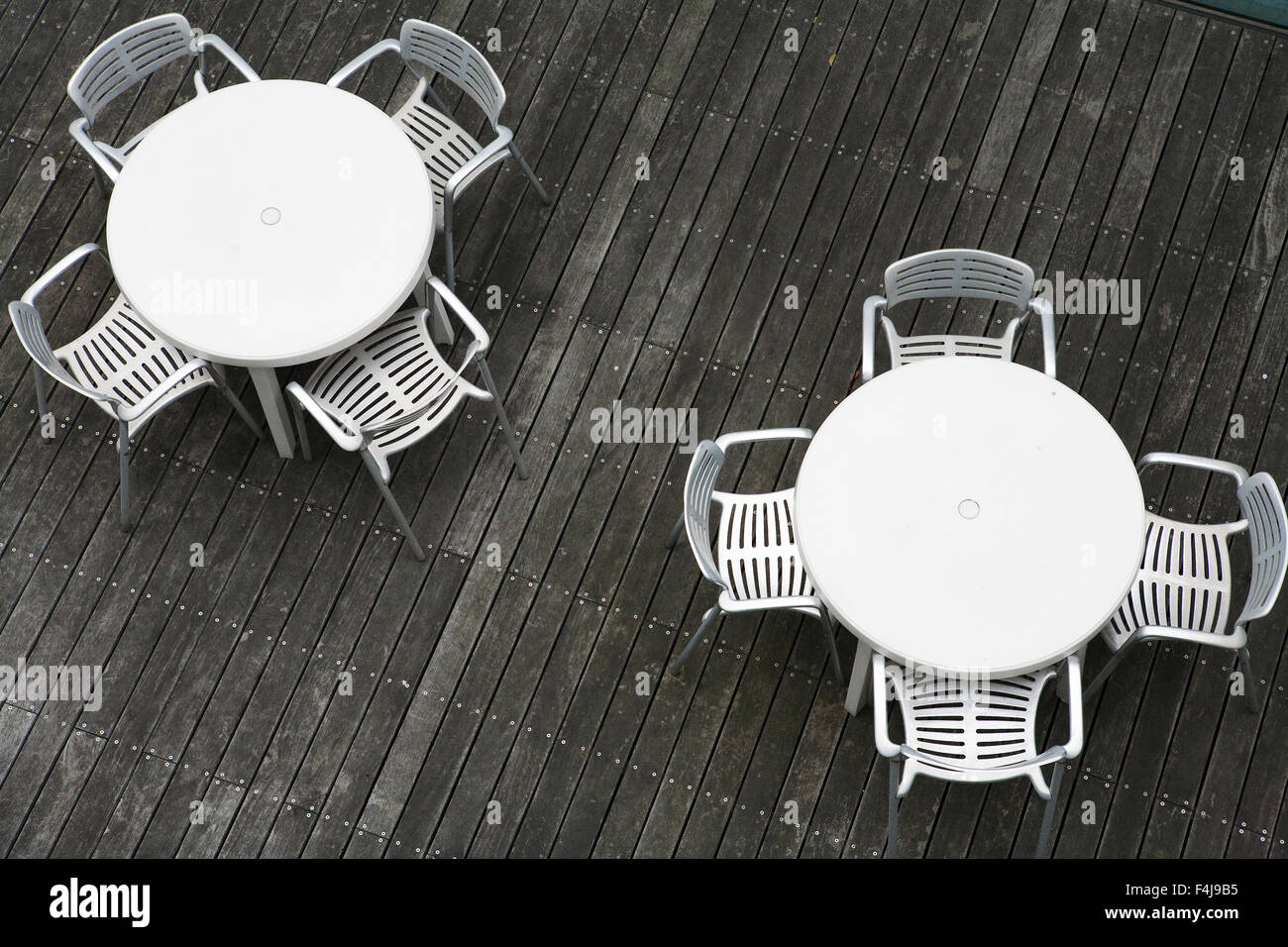 Chairs around a table Stock Photo Alamy