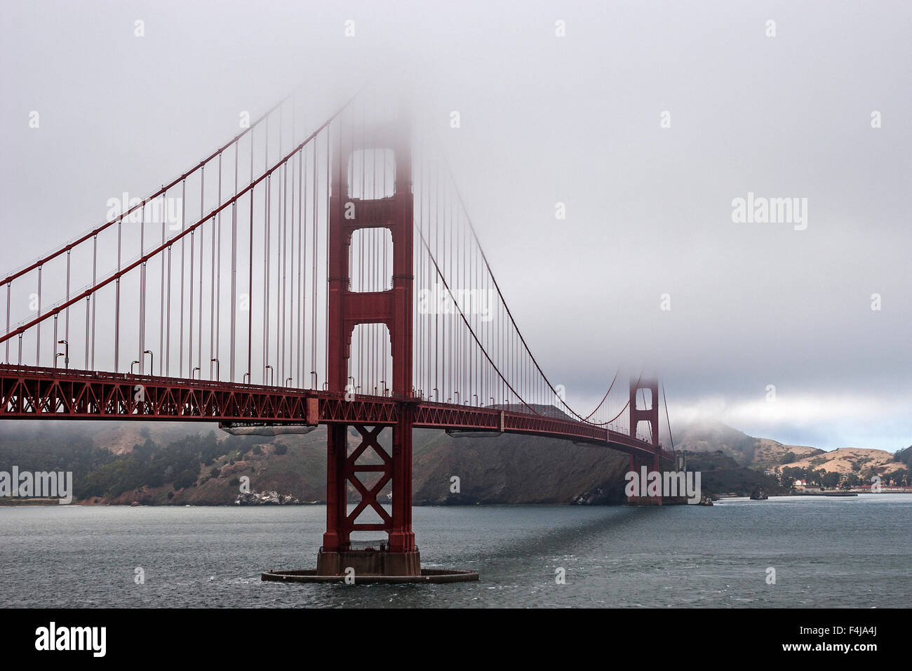 Golden Gate Bridge partially covered in fog, San Francisco, California, USA Stock Photo