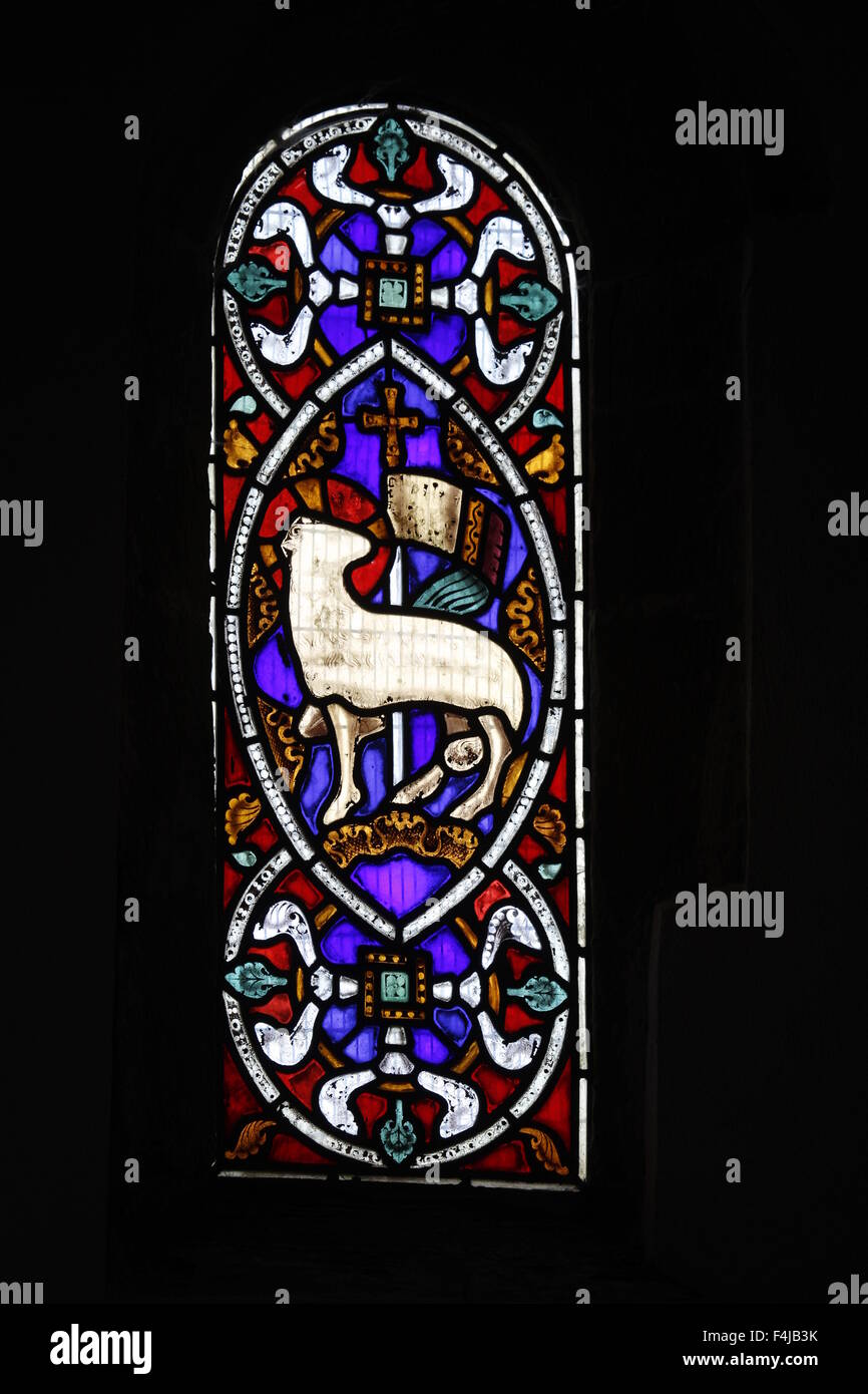 Stained glass window by Augustus Welby Pugin depicting the Lamb of God, Kilpeck Church, Herefordshire, England Stock Photo