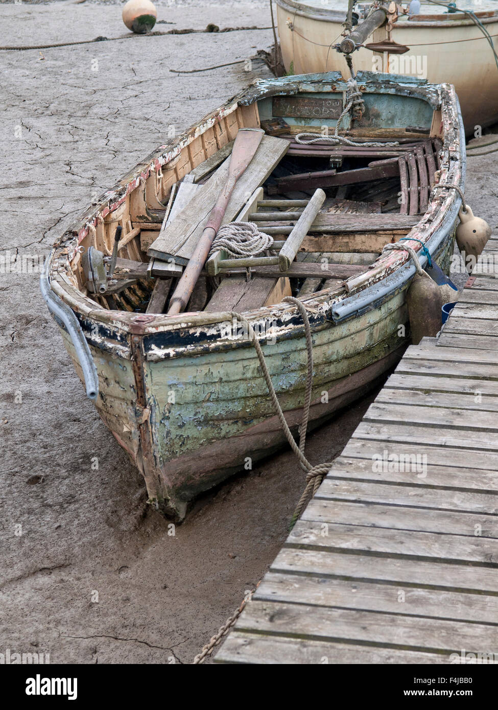 Little old fishing boat moored on the river Colne at Wivenhoe. Essex. England. UK Stock Photo