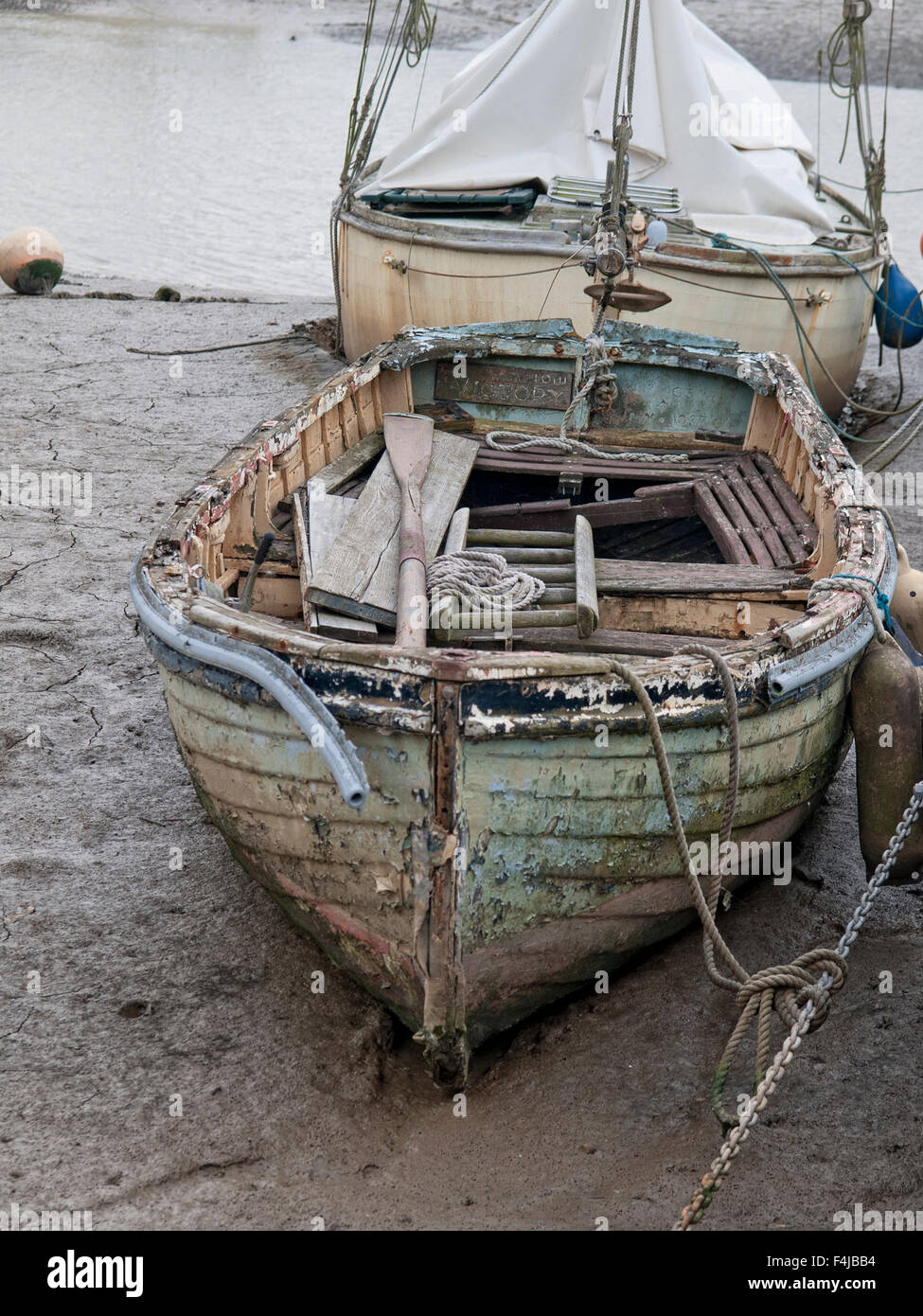 Little old fishing boat moored on the river Colne at Wivenhoe. Essex. England. UK Stock Photo