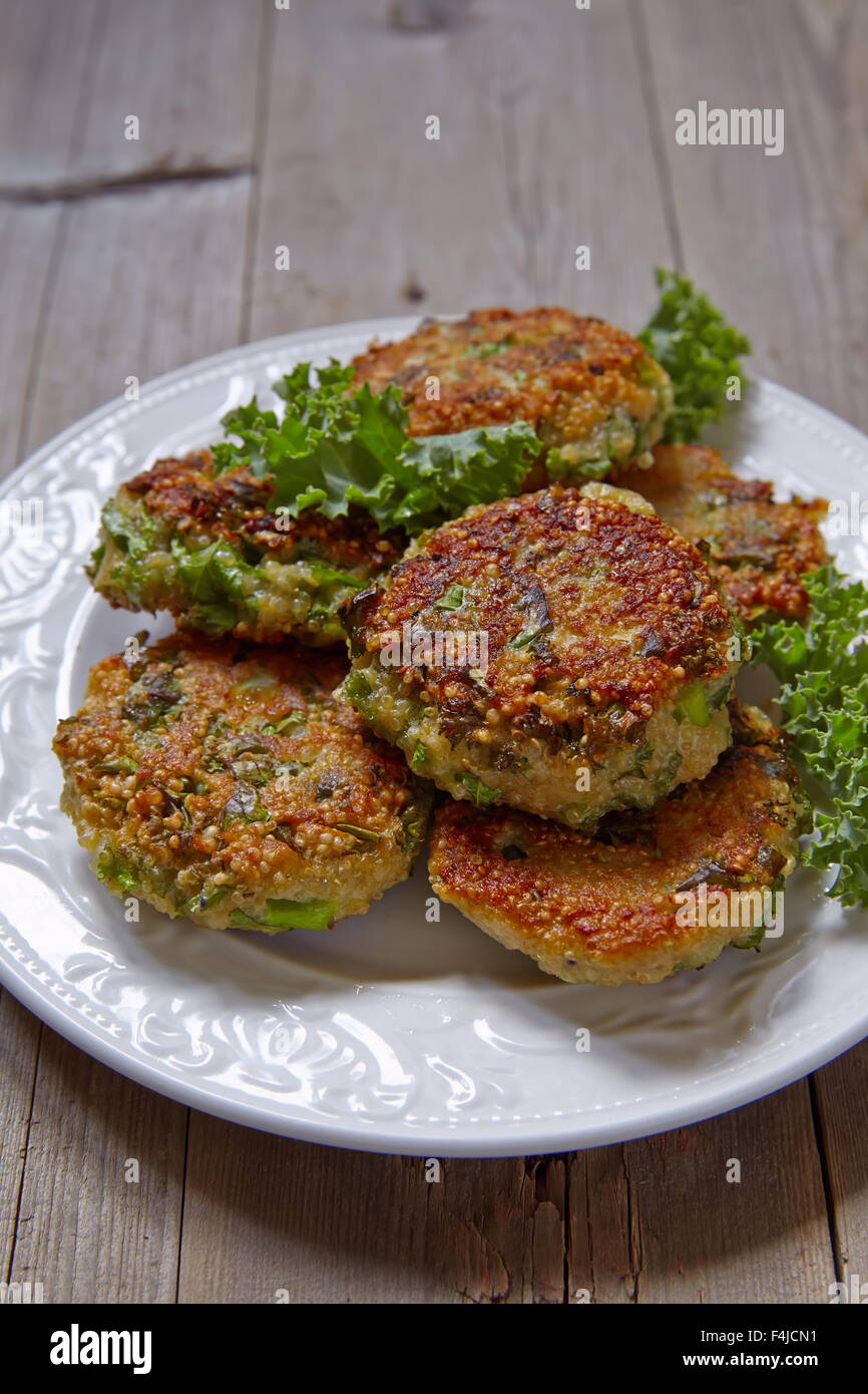 Quinoa fritters with kale and cheddar Stock Photo