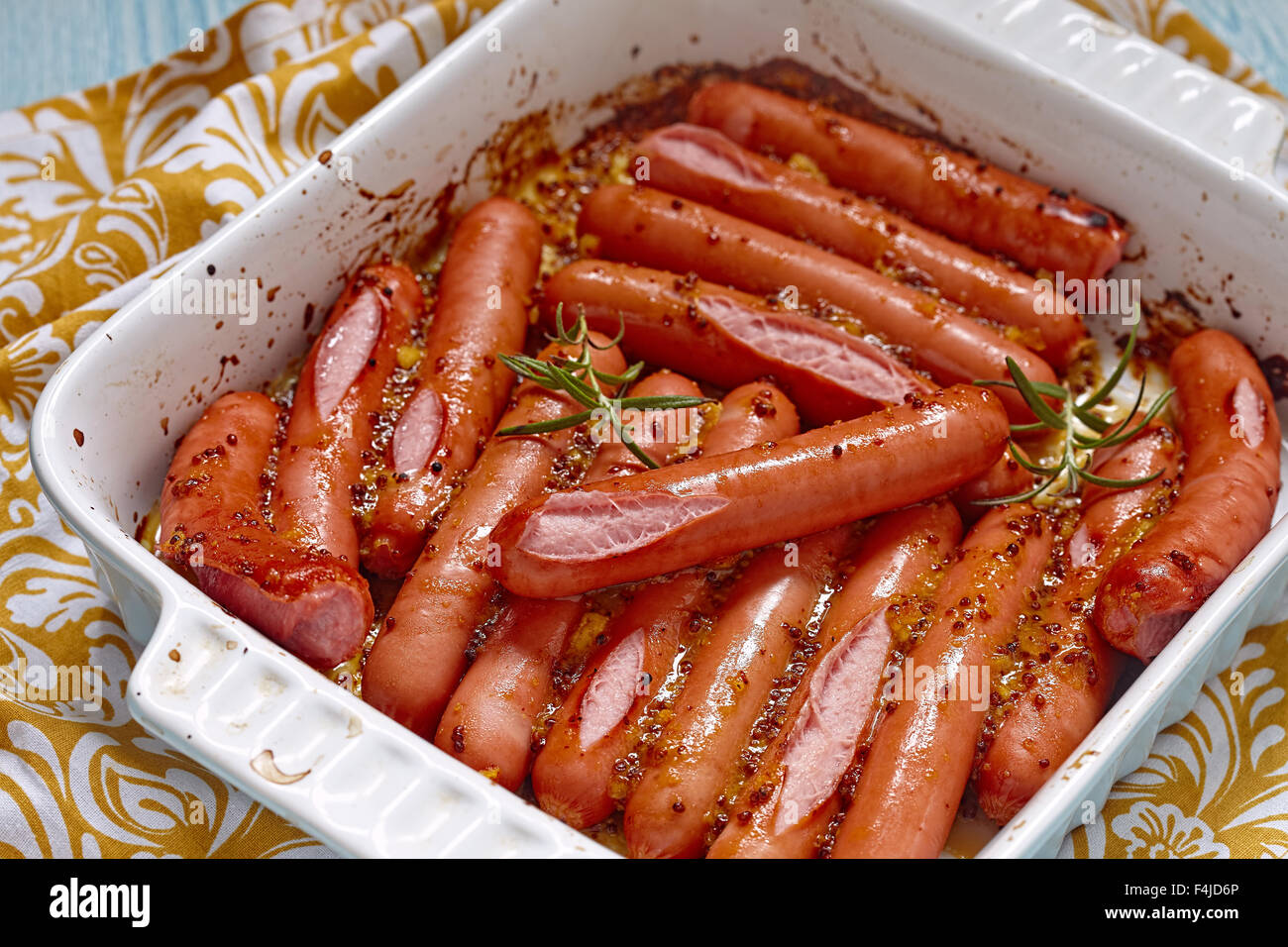 Roasted sausage with mustard orange sauce Stock Photo Alamy