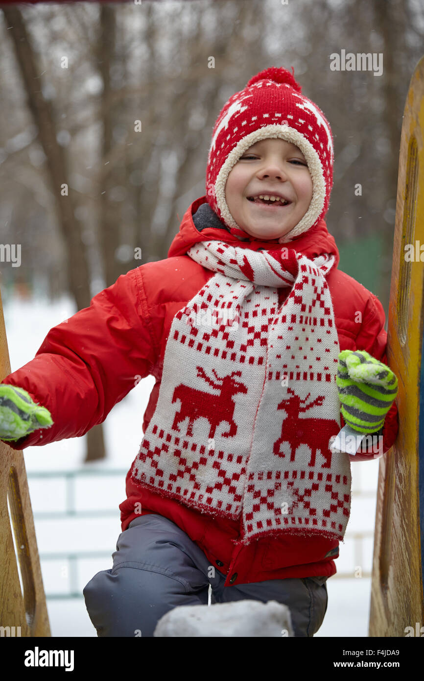 Adorable little boy in winter park Stock Photo - Alamy