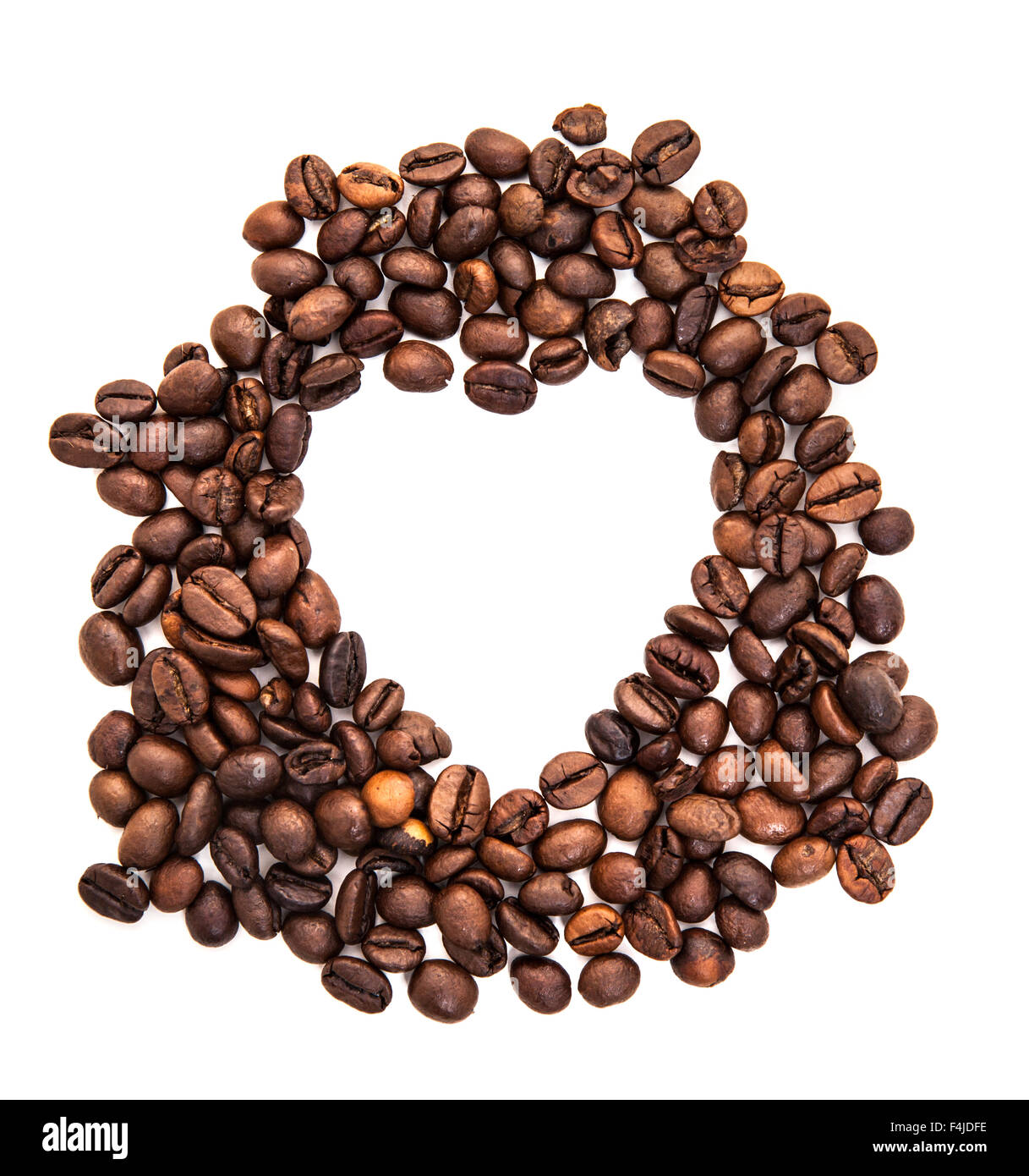 Heart shape out of fine roasted coffee beans Stock Photo