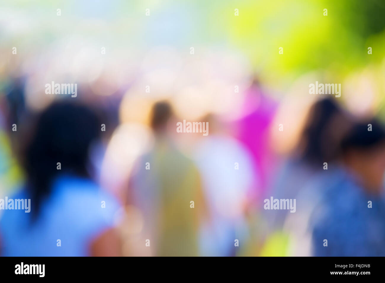 Blur crowd of people at outdoors concert, social event background, vivid colors, defocus image. Stock Photo