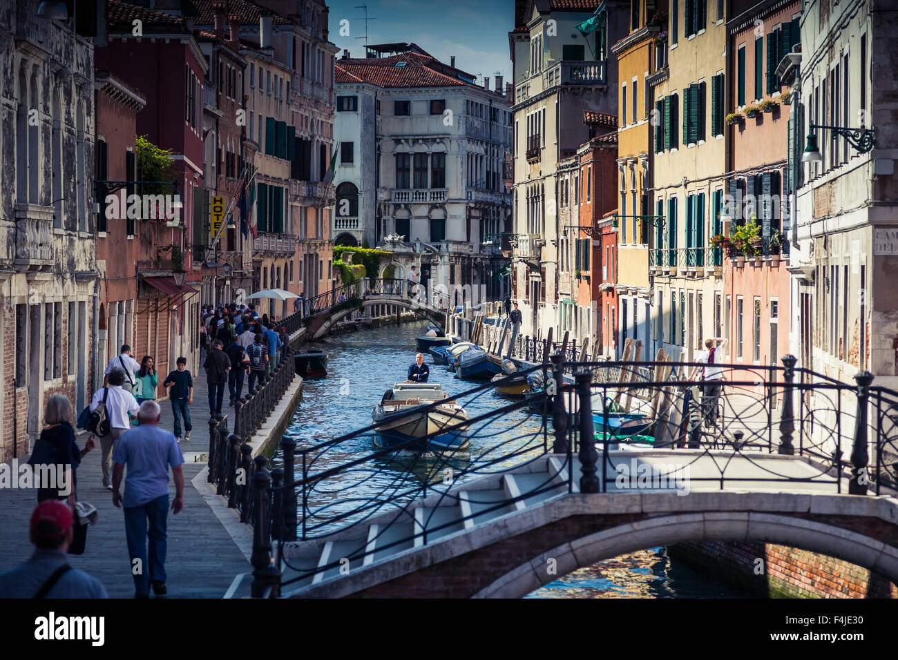 Boats and gondola on canals in Venice Stock Photo
