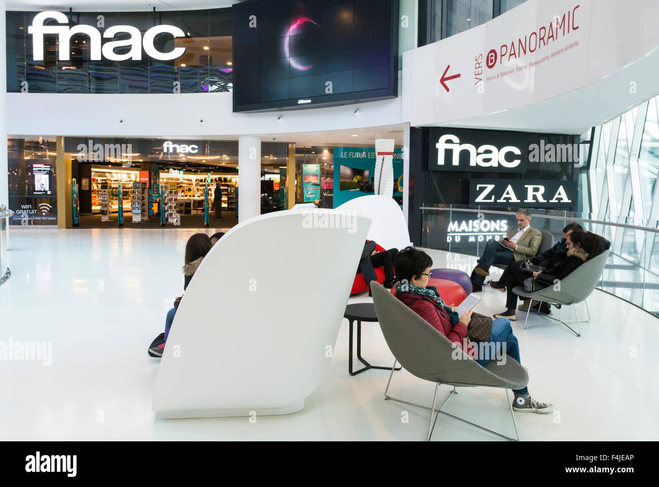 Paris, France, People relaxing inside French Shopping Mall, "Centre  commercial Beaugrenelle" FNAC Store modern retail interiors, contemporary  retail interior design, shopping centre interior france Stock Photo - Alamy