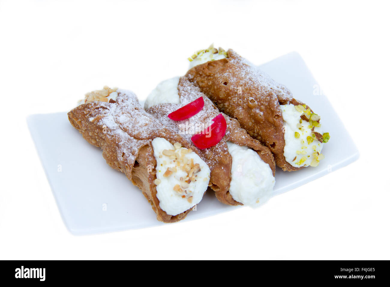 Cannoli with ricotta cheese on white background Stock Photo Alamy