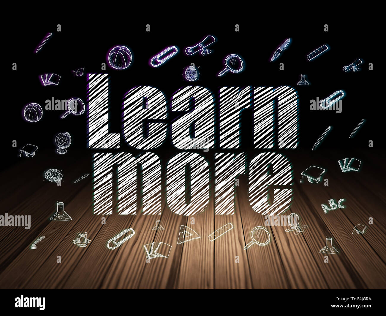 Learning concept: Learn More in grunge dark room Stock Photo - Alamy