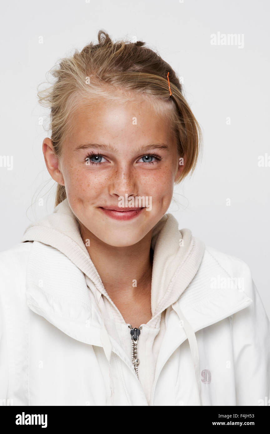 Portrait of smiling teenage girl Stock Photo - Alamy