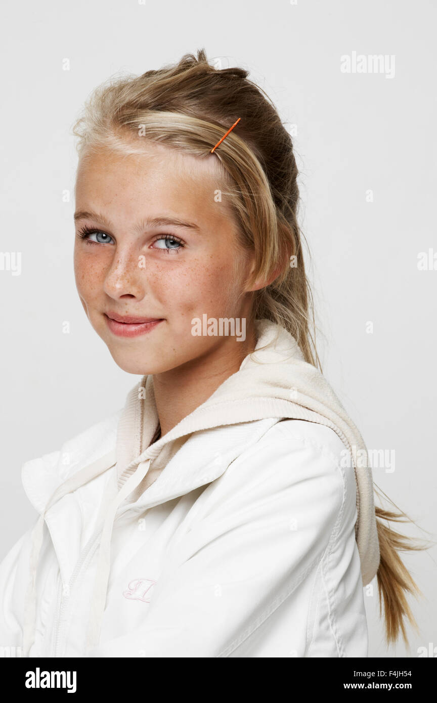 Portrait of smiling teenage girl Stock Photo - Alamy