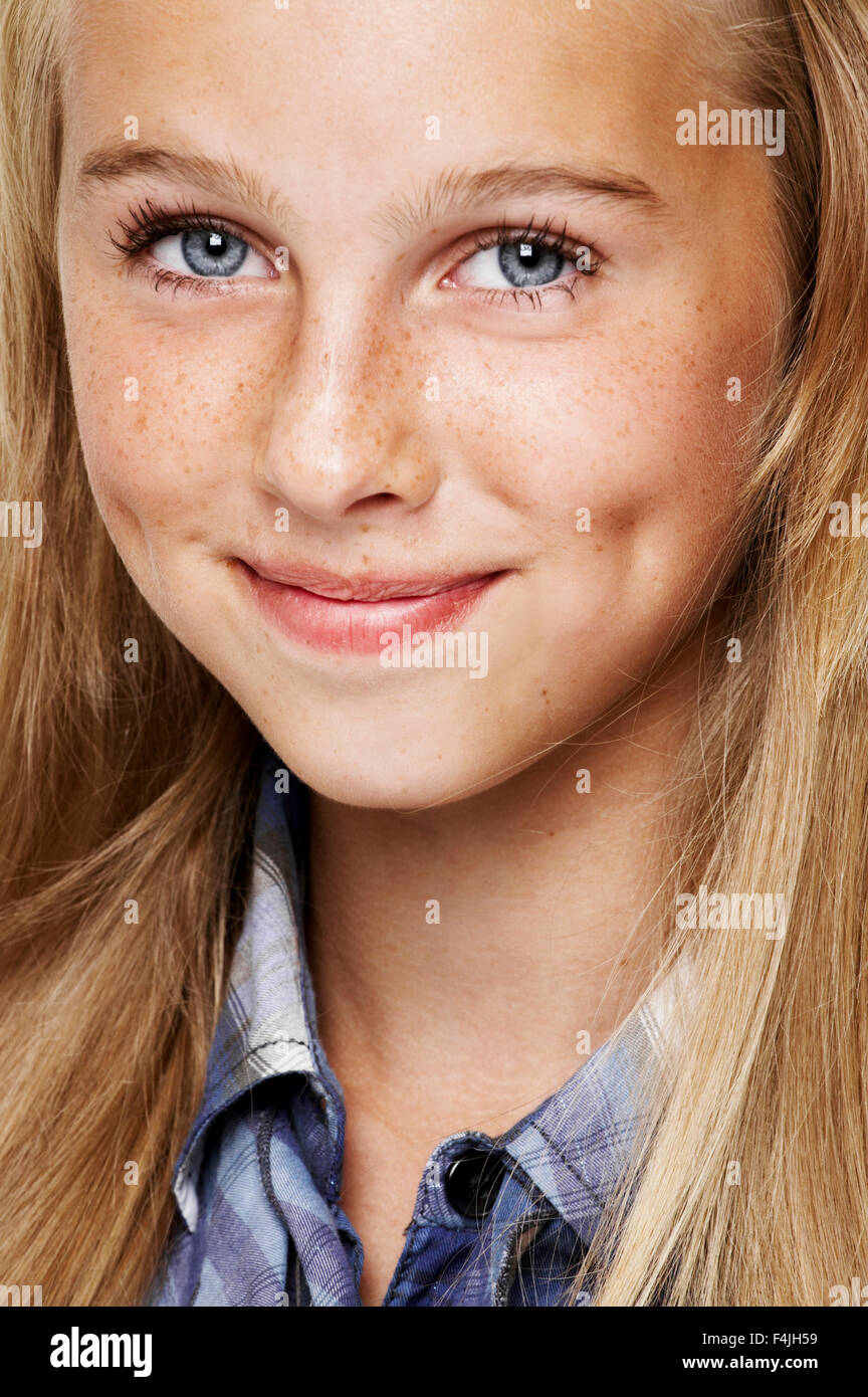 Portrait of smiling teenage girl Stock Photo - Alamy