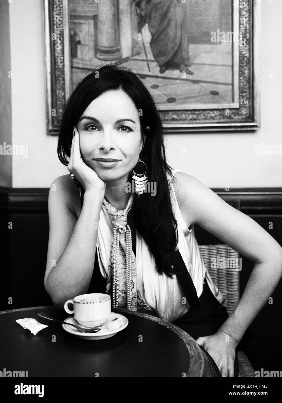 France, Paris, portrait of young woman in cafe Stock Photo