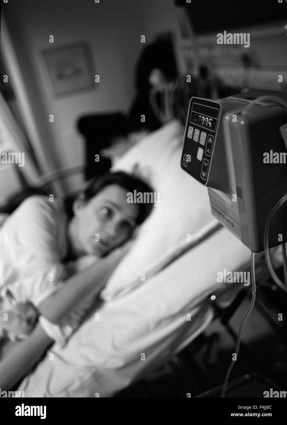 Young woman hospital bed Black and White Stock Photos & Images - Alamy
