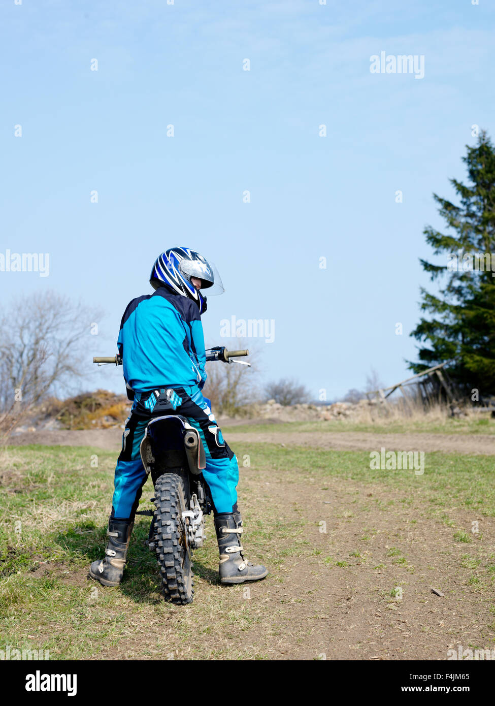 Sweden, Scania, Simrishamn, teenage boy (14-15) on motorbike Stock Photo