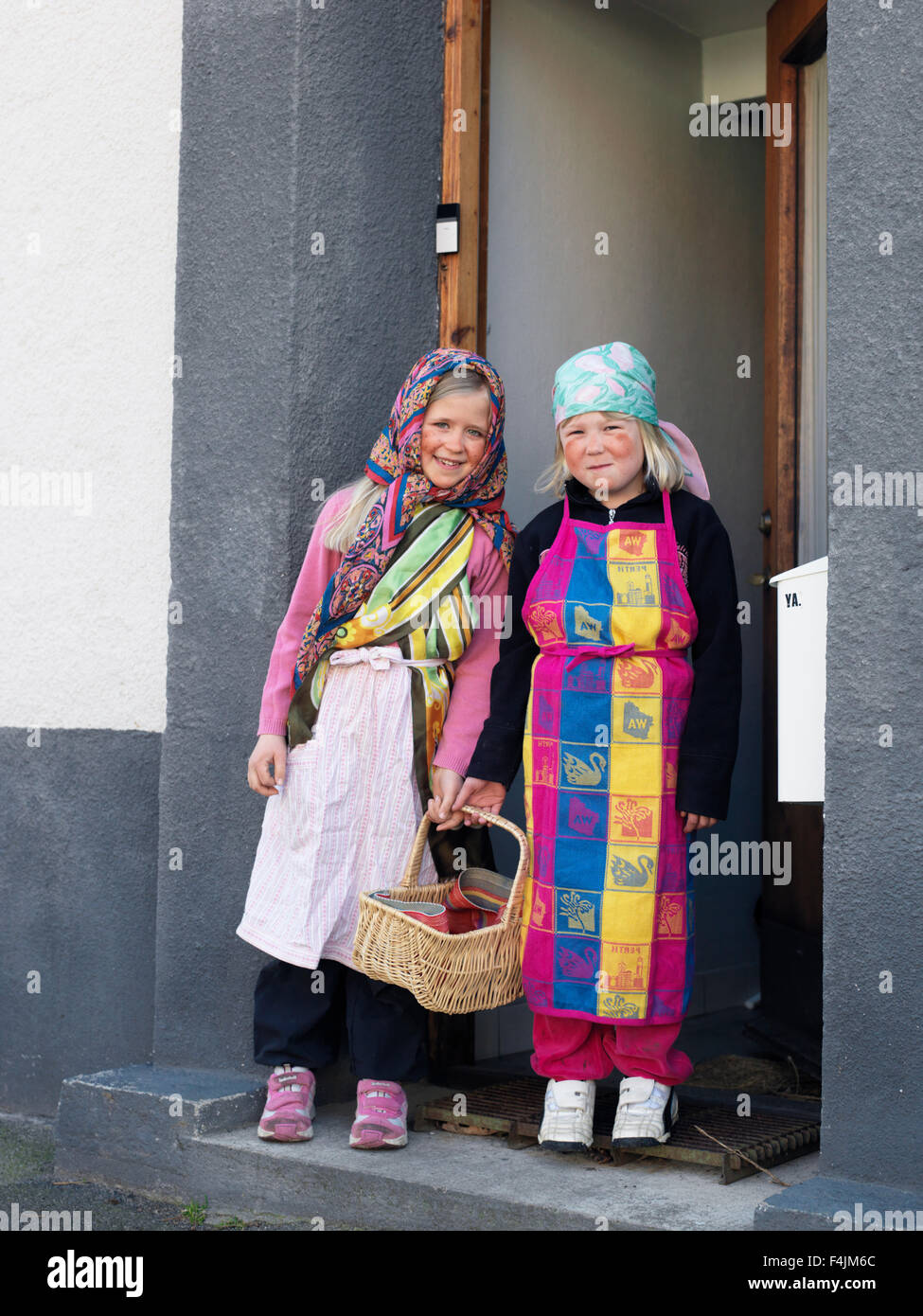 Sweden, Scania, Simrishamn, portrait of two girls (10-11) wearing traditional costumes Stock Photo