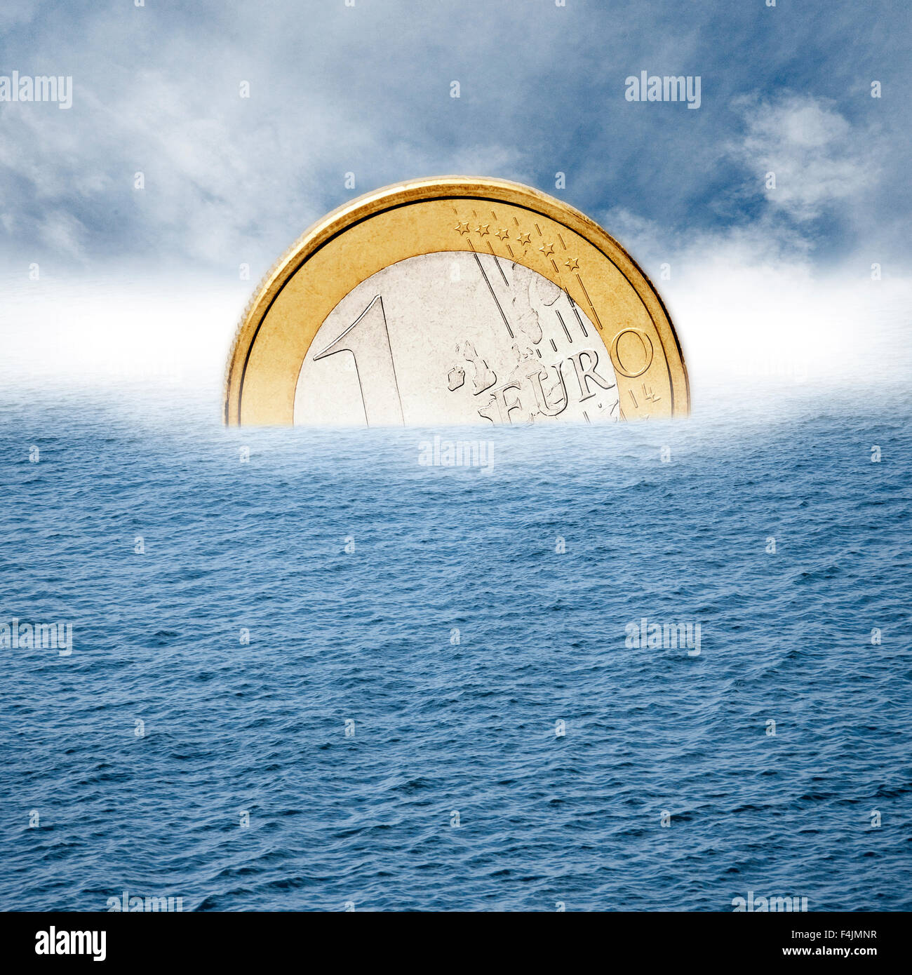 Euro coin sinking in water Stock Photo Alamy