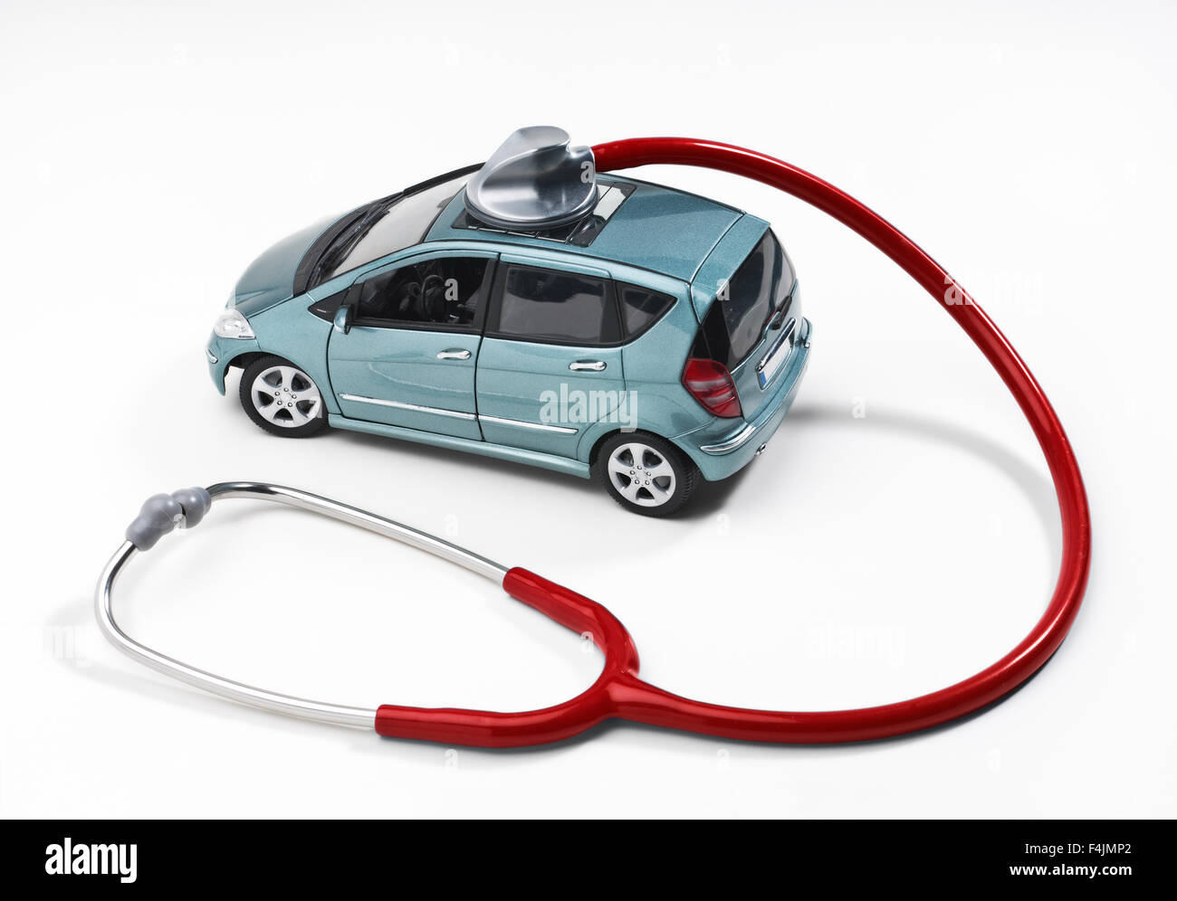 Car is monitored with a stethoscope. Stock Photo