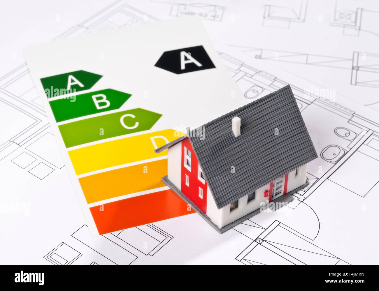 Energy efficiency label with model and architecture blueprint Stock Photo