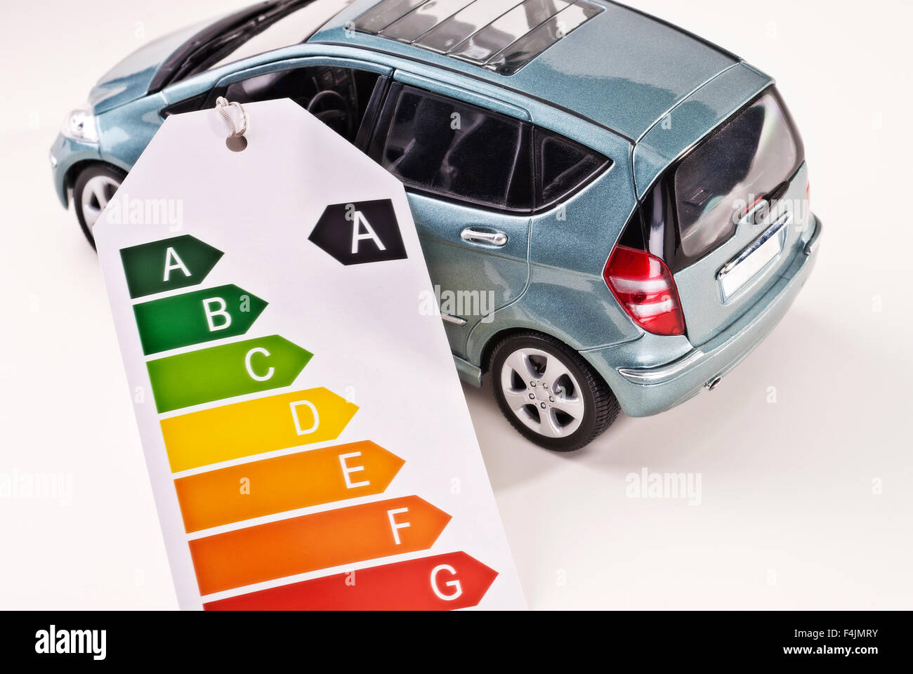Car with efficiency label as an indication of low emissions. Stock Photo