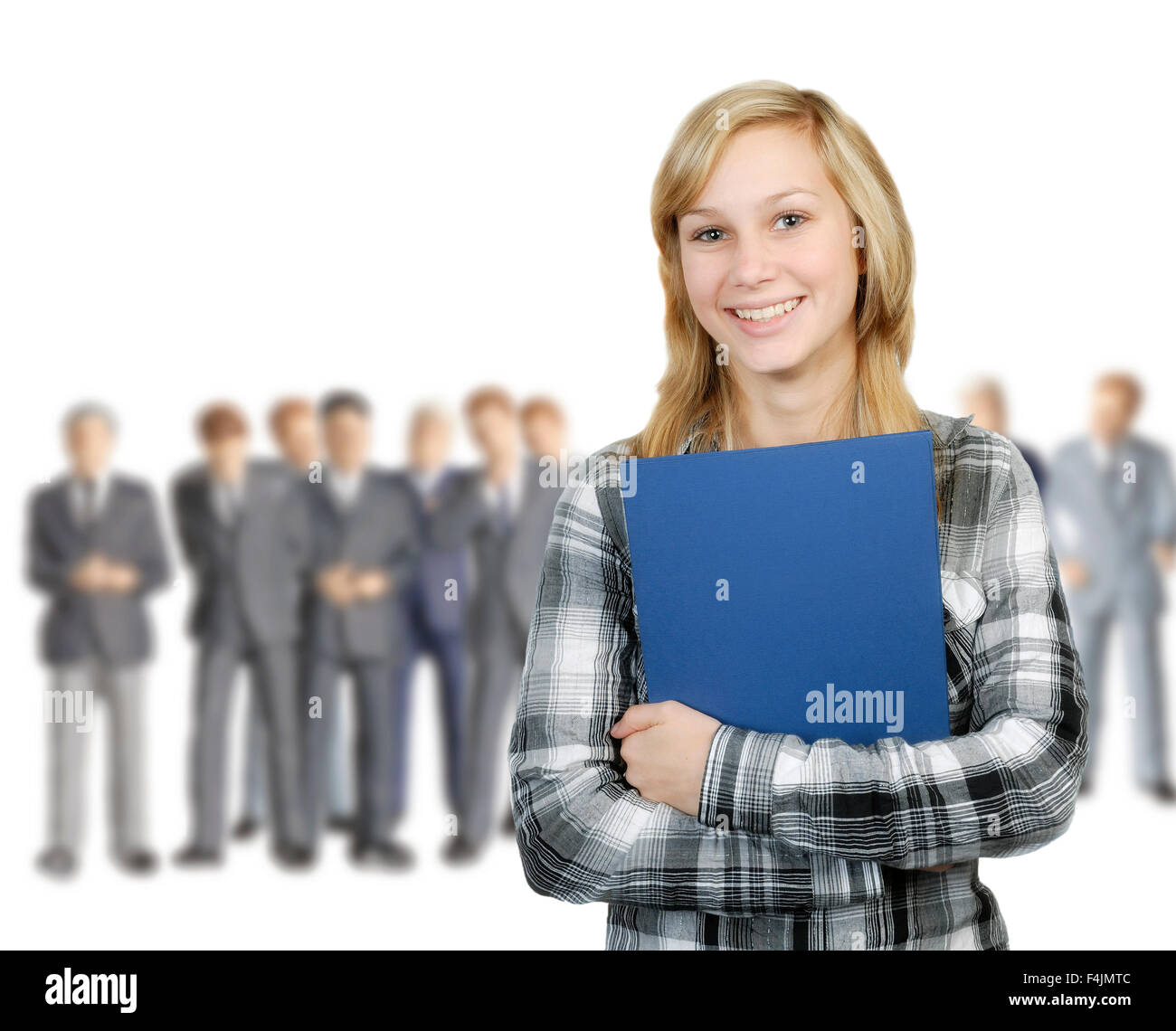 Young woman stands in front of a group of business men. Stock Photo