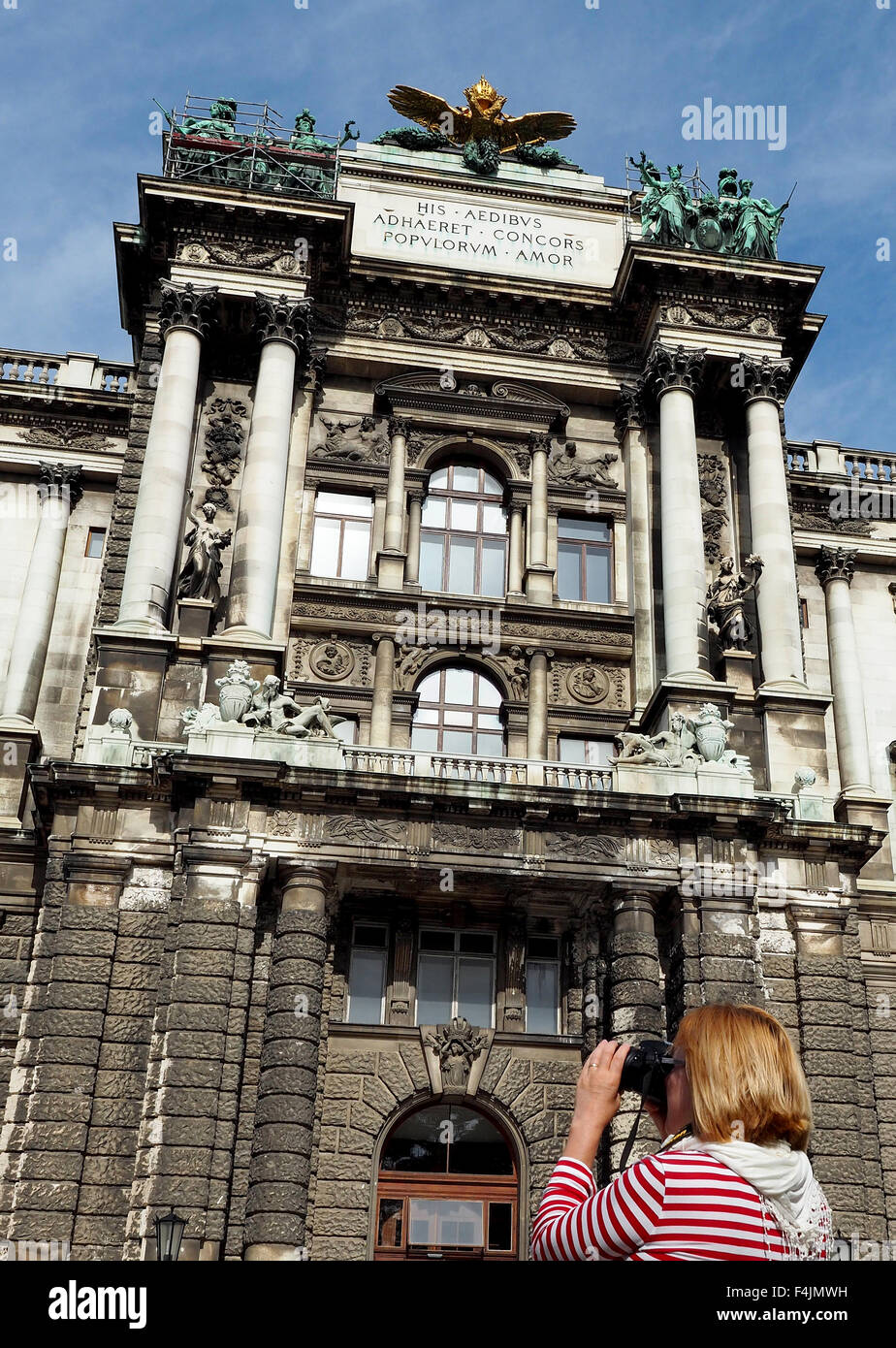 Woman photographing outside the Hofburg Palace Vienna, Austria Stock Photo
