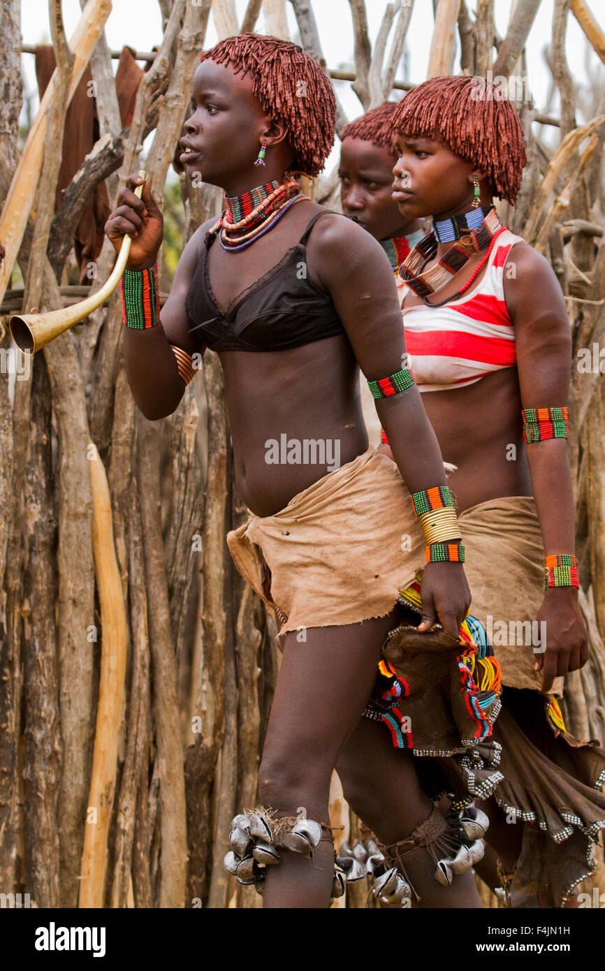 Hamer Women anxiously wait at the traditional whipping ritual. Omo ...