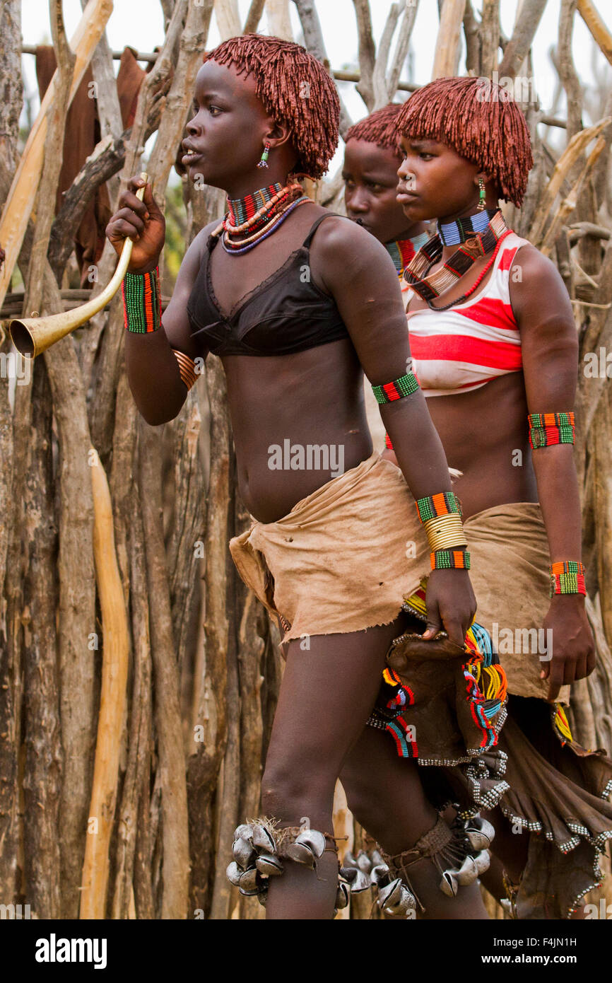 Hamer Women anxiously wait at the traditional whipping ritual. Omo Valley, Ethiopia Stock Photo