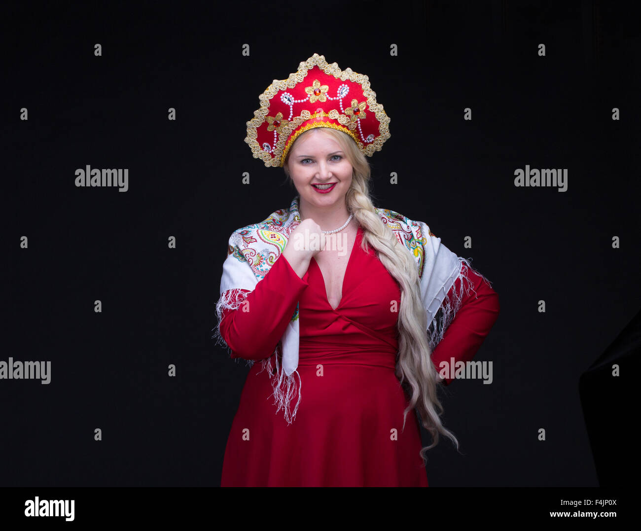 Girl Standing In Russian Traditional Costume Do Selfie Woman Is Wearing Sarafan And Kokoshnik