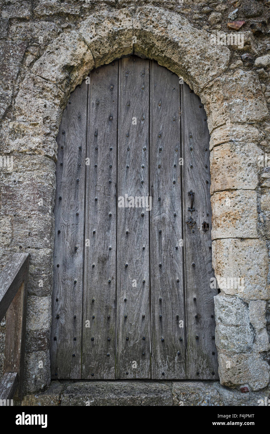 old wooden door in stone building Stock Photo - Alamy