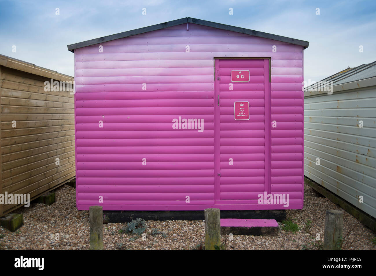 Pink beach hut on Hayling Island Stock Photo