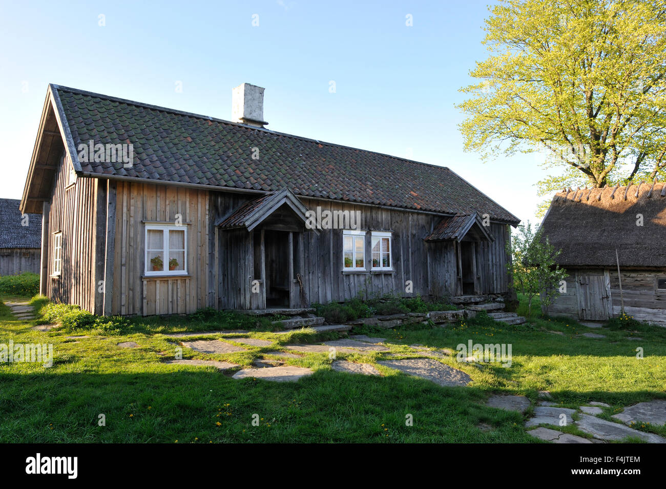 Wooden cottages in summer Stock Photo - Alamy