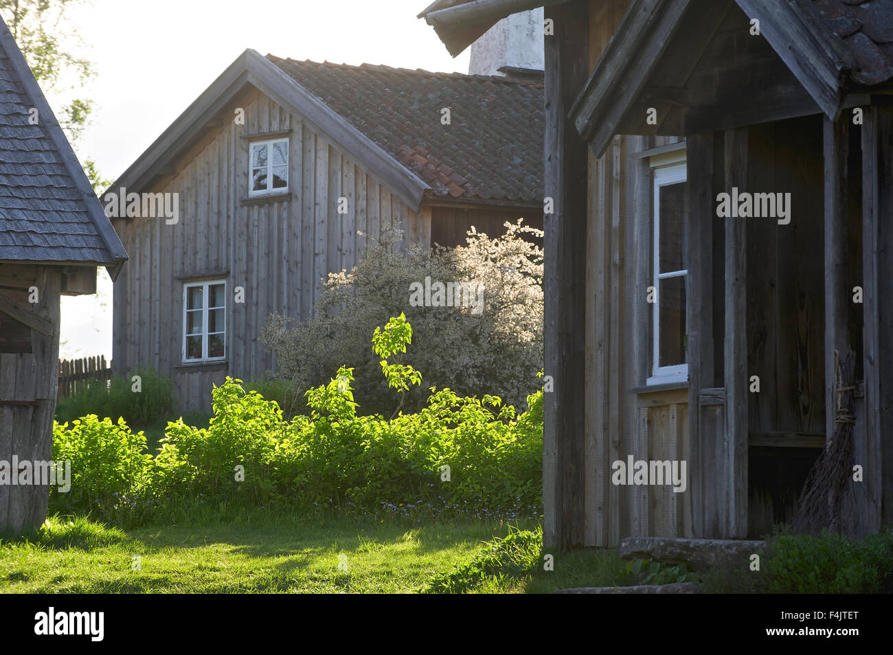 Wooden cottages in summer Stock Photo - Alamy