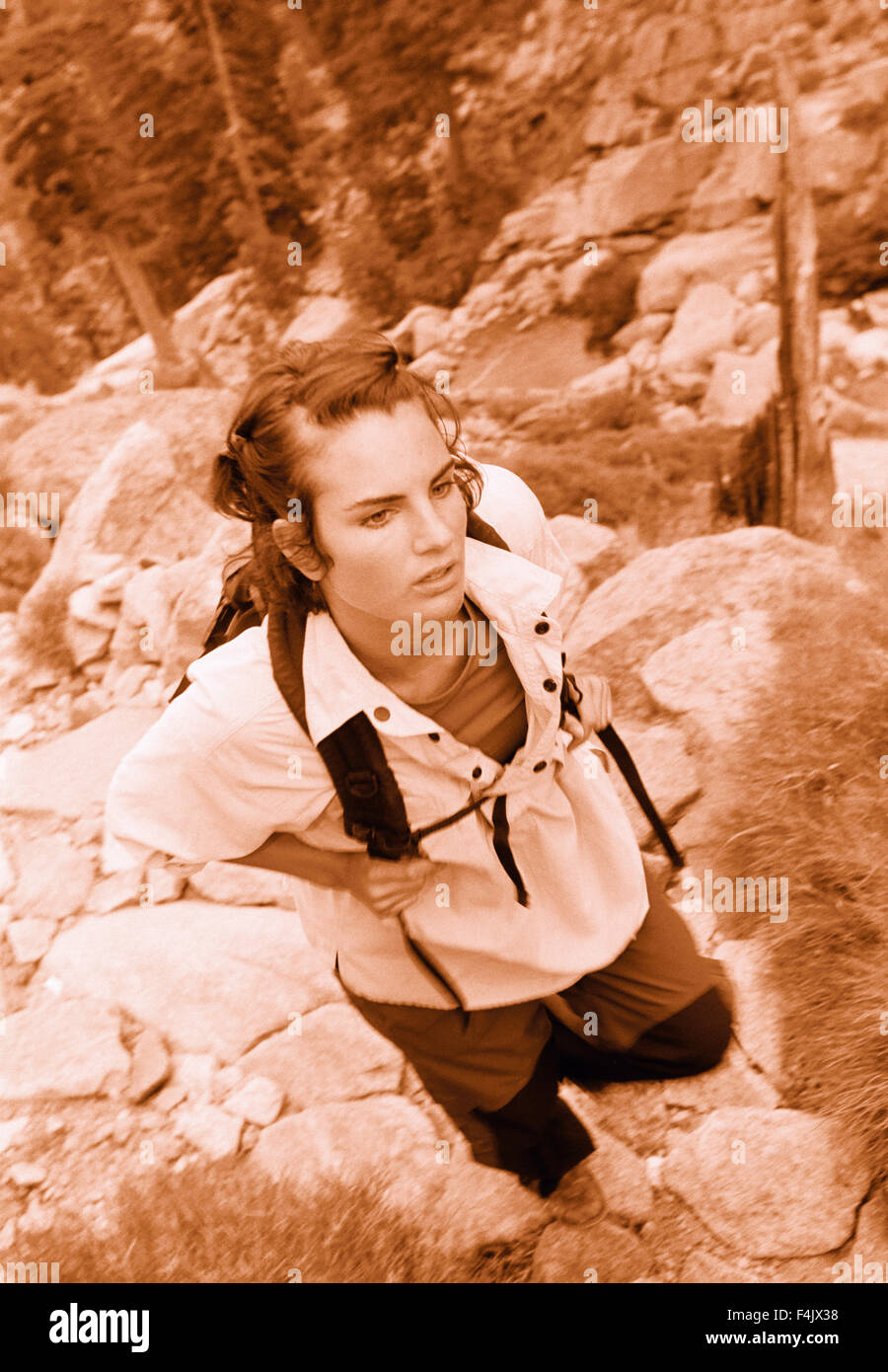 Woman hiking through mountain hi-res stock photography and images - Alamy