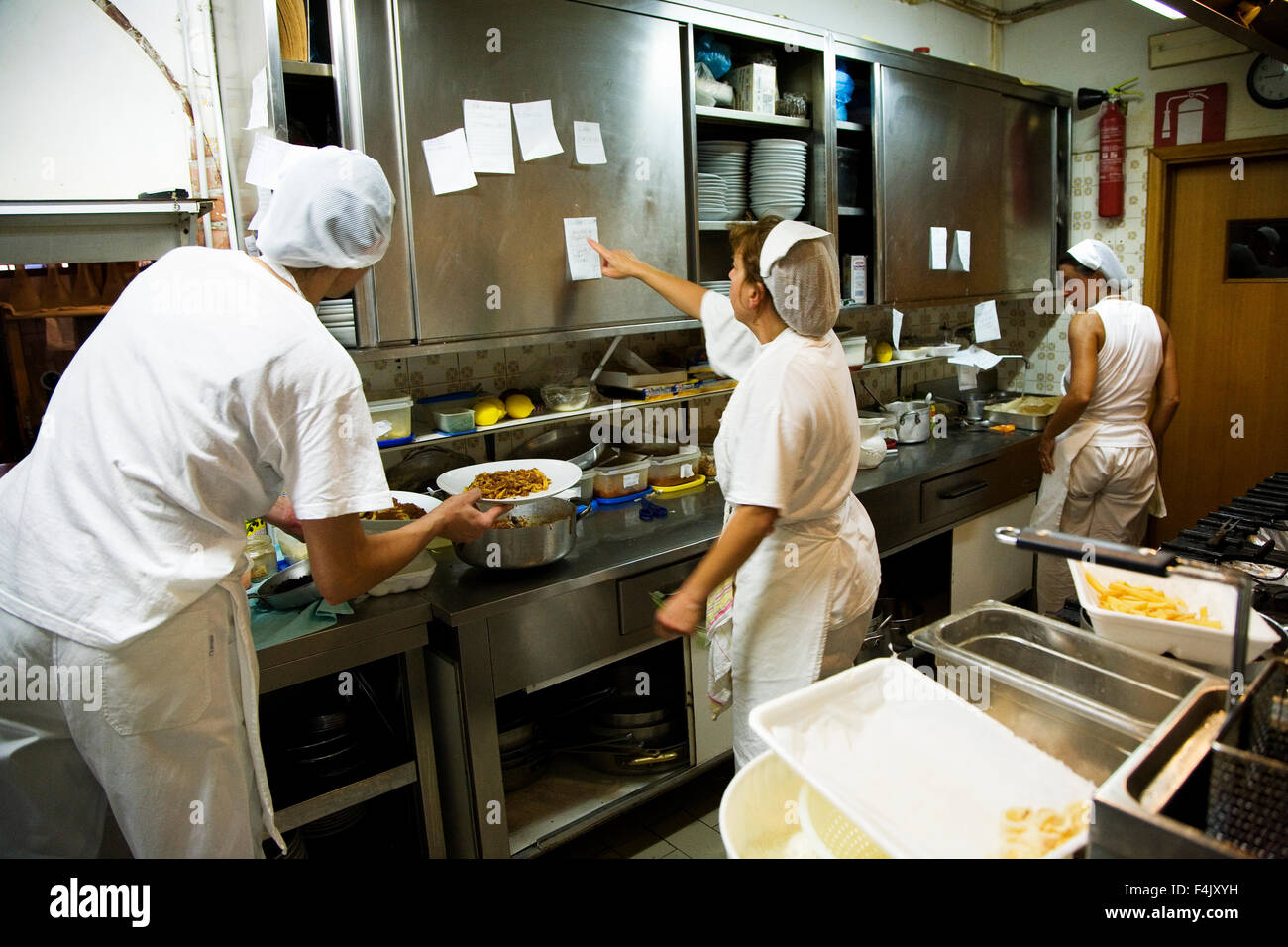 Kitchen staff at local restaurant Stock Photo Alamy