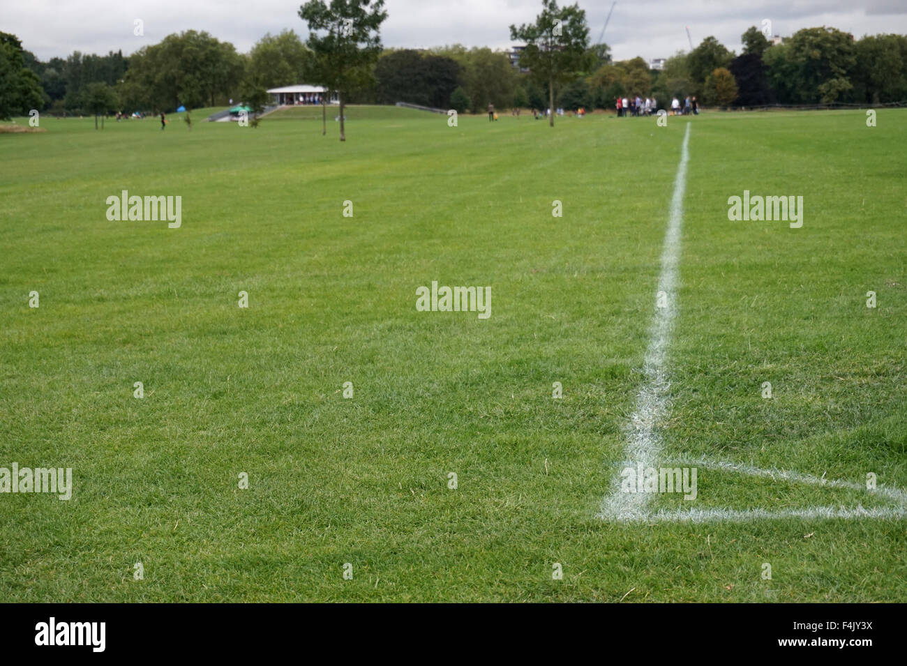 The penalty spot on a football pitch at The Hub sports ground at Regent's Park, London, England