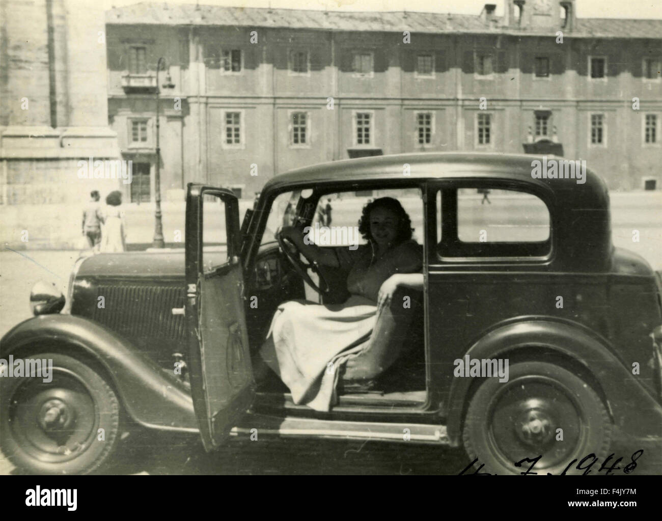 Woman driving a car, Italy Stock Photo Alamy