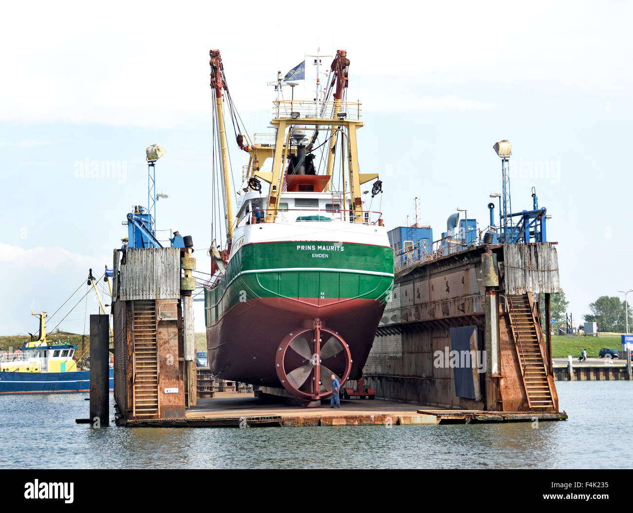 Oudeschild Texel Netherlands fishing trawler floating dry dock shipyard port harbor Wadden Sea Waddenzee Wad Stock Photo