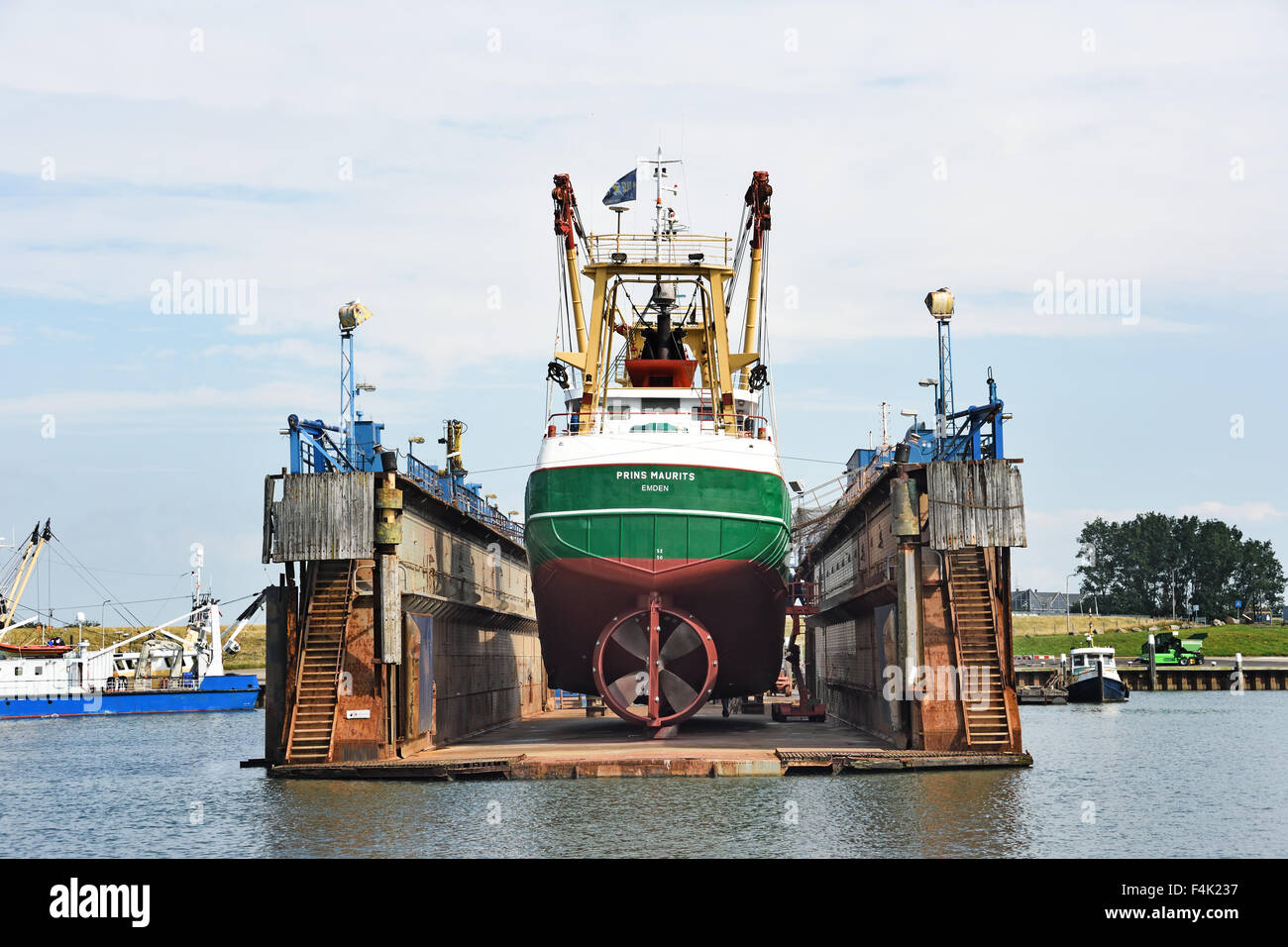 Oudeschild Texel Netherlands fishing trawler floating dry dock shipyard port harbor Wadden Sea Waddenzee Wad Stock Photo