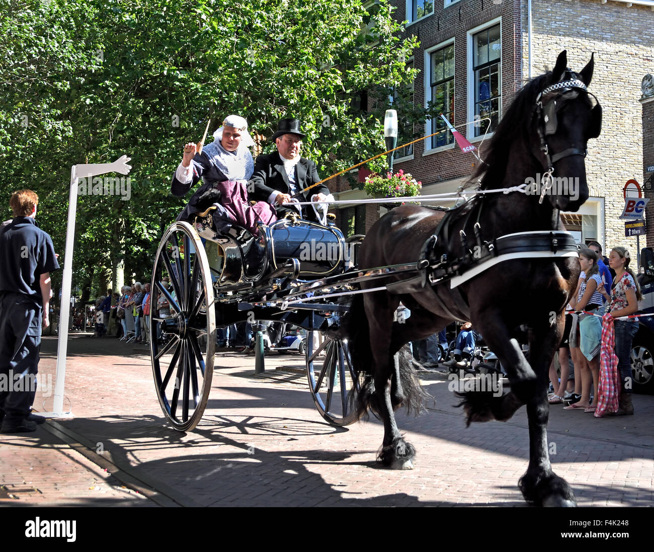 Harlingen Friesland Stabbing ring or ring drive is a folk tradition horse cart ( lance through a ring trying to stabbing ) Nethe Stock Photo