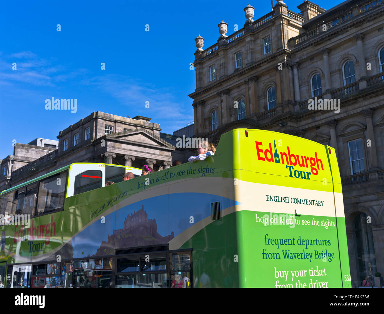 dh  PRINCES STREET EDINBURGH Child viewing Edinburgh Tour bus open top double decker upper deck tourist tours Stock Photo