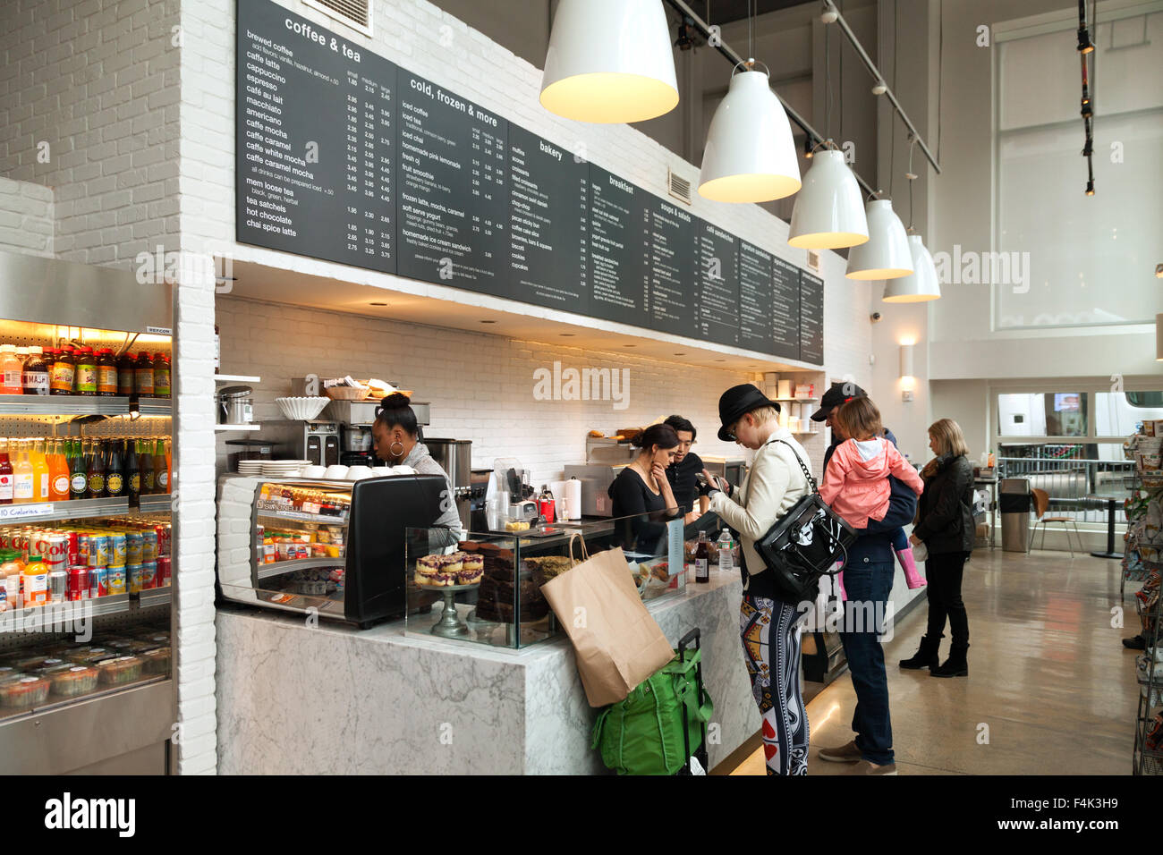 Customers buying food and drink for breakfast, the Sorelle bakery