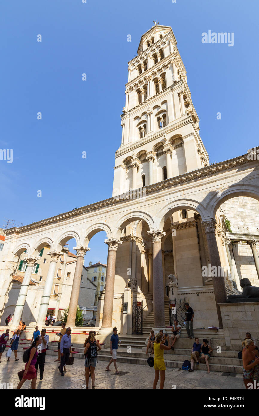 People in front of the Cathedral of Saint Domnius' bell tower at the Diocletian's Palace in Split, Croatia. Stock Photo