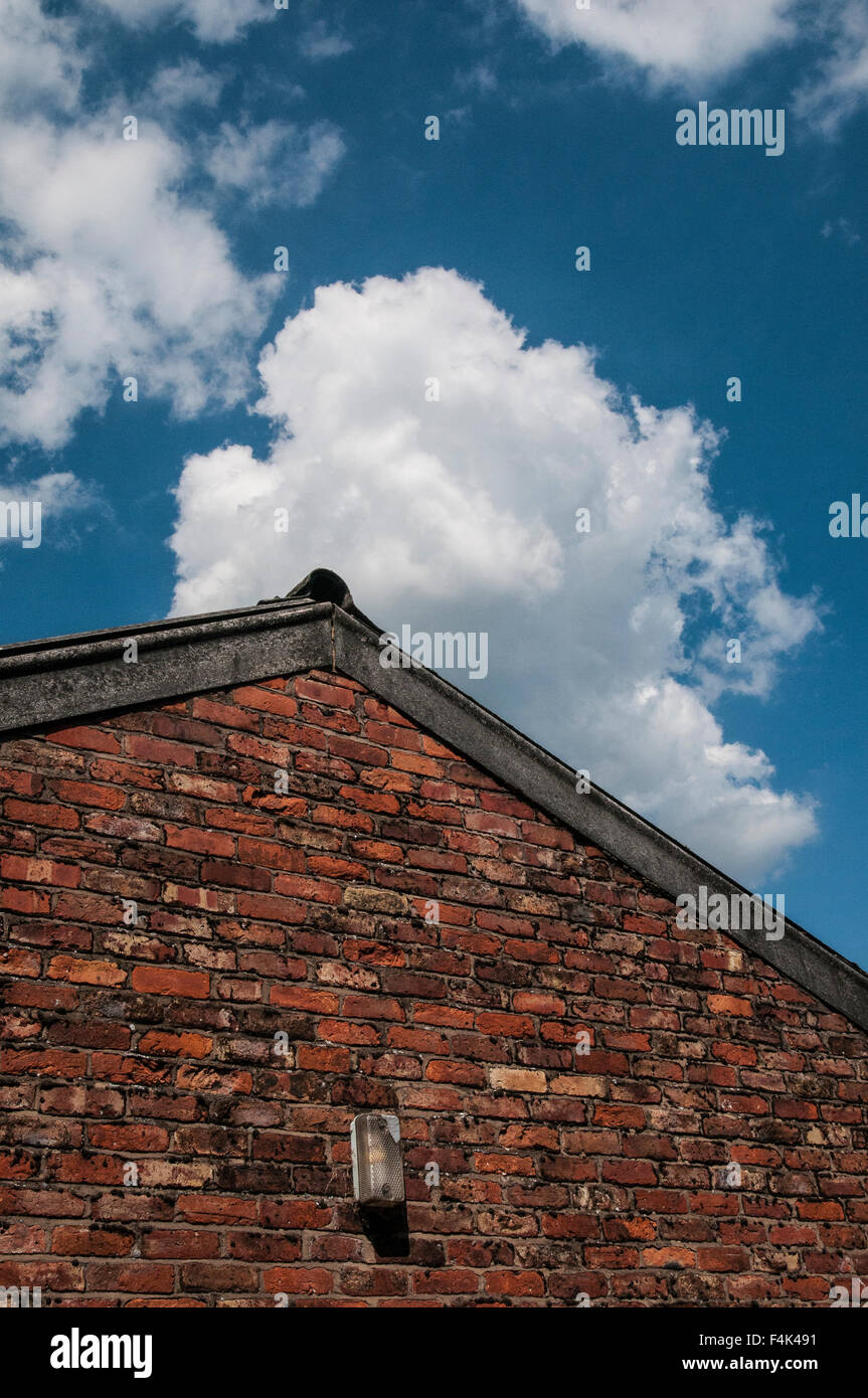 Clouds over gable end Stock Photo - Alamy