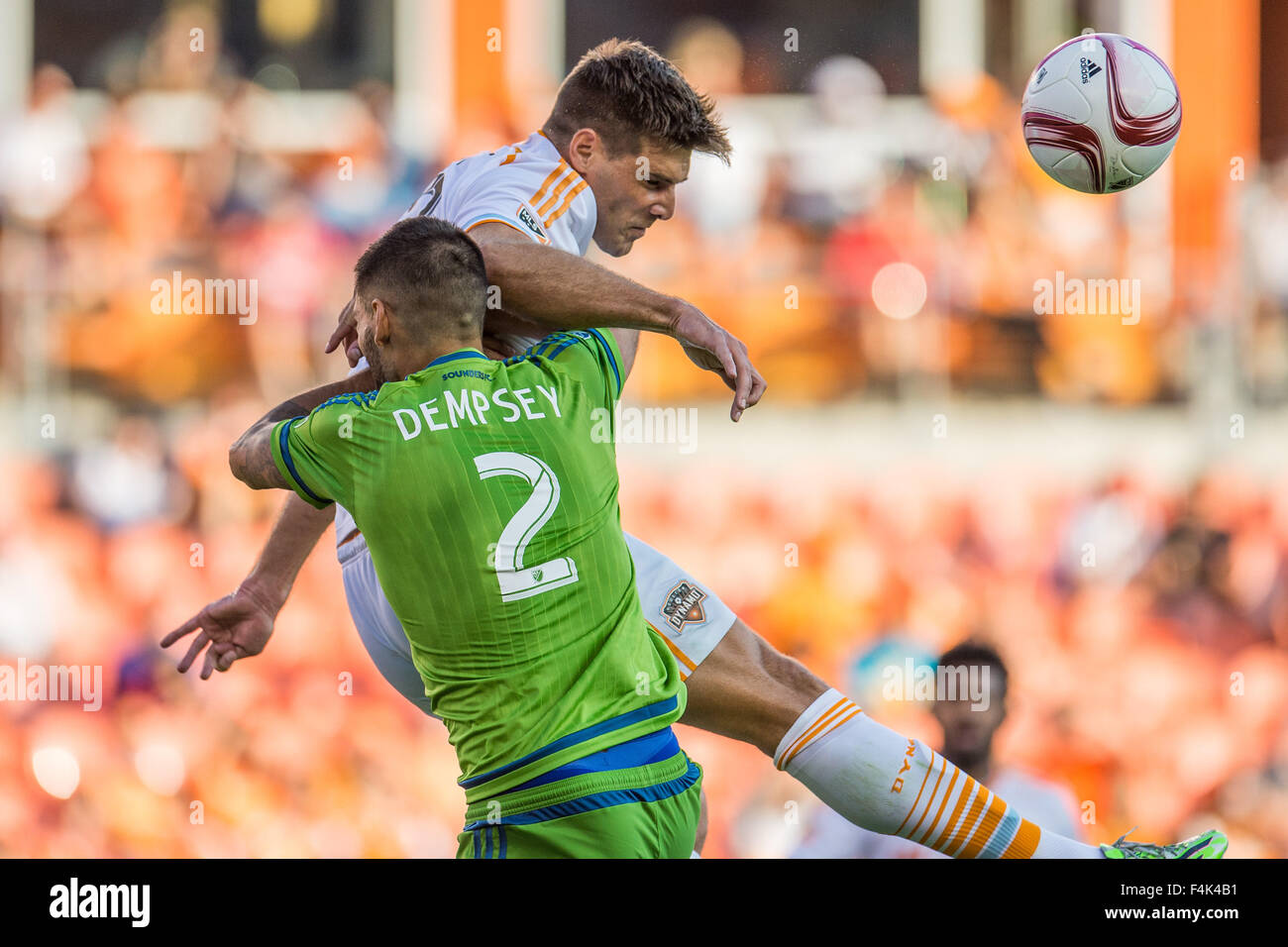 Houston, Texas, USA. 18th Oct, 2015. Seattle Sounders FC forward CLINT DEMPSEY (2) collides with Houston Dynamo defender DAVID HORST (18) after Horst heads the ball during the 2nd half of an MLS game between the Houston Dynamo and the Seattle Sounders at BBVA Compass Stadium. © Trask Smith/ZUMA Wire/Alamy Live News Stock Photo