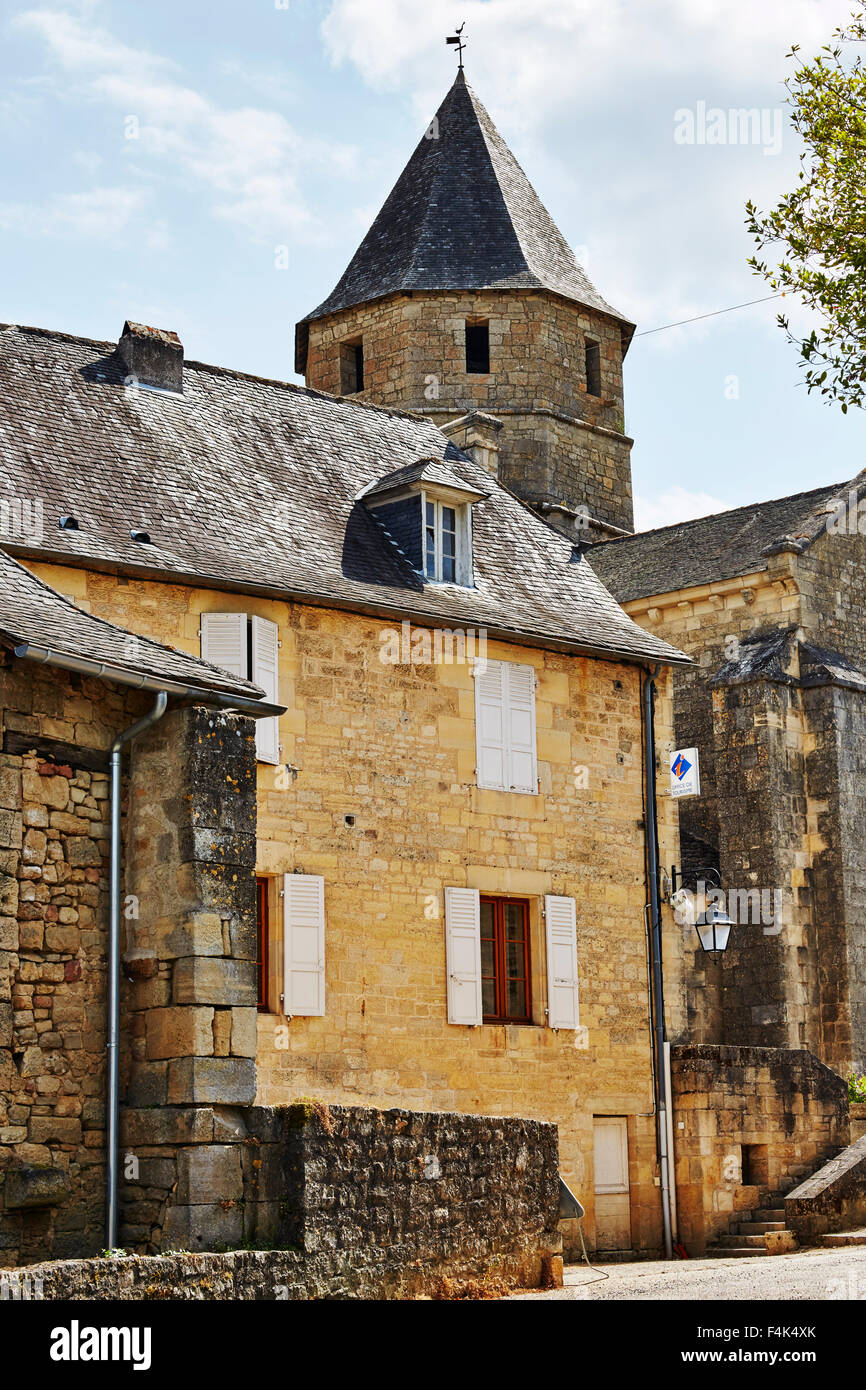 A street view in the village of Saint-Robert, Correze, Limousin, France including the church. Stock Photo